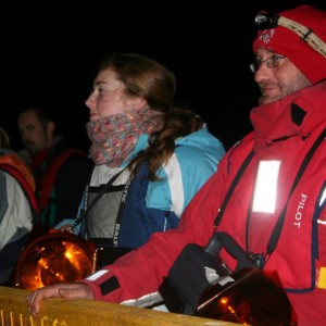 Torchbearers on gangway